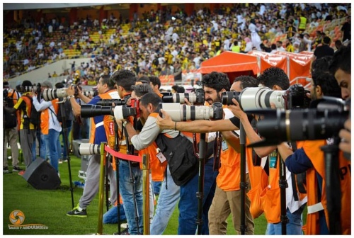 Group of sports photographers