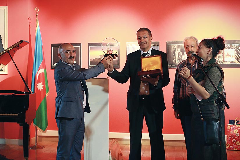Mr. Umudov receiving the GPU representative plaque from Mr. Metzakis Mr. Umudov receiving the GPU representative plaque from Mr. Metzakis